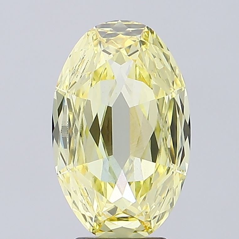 Loose Diamond - OVAL 4.25ct Fancy Yellow VS1: Loose Diamond - OVAL 4.25ct Fancy Yellow VS1 Source: This is a real non-mined Diamond that has been grown in a lab Shape: OVAL Carats: 4.25 Color: Fancy Yellow Certification: IGI Video: