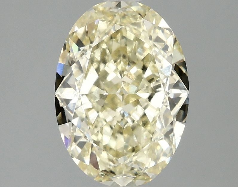 Loose Diamond - OVAL 2.1ct Fancy Intense Yellow VVS2: Loose Diamond - OVAL 2.1ct Fancy Intense Yellow VVS2 Source: This is a real non-mined Diamond that has been grown in a lab Shape: OVAL Carats: 2.1 Color: Fancy Intense Yellow Certification: IGI Video: