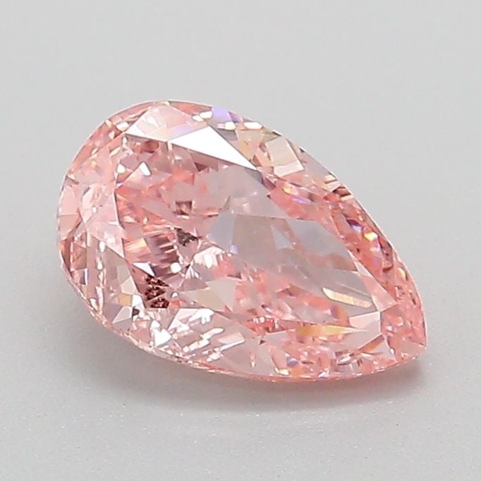 Loose Diamond - PEAR 1.0ct Fancy Vivid Pink VS1: Loose Diamond - PEAR 1.0ct Fancy Vivid Pink VS1 Source: This is a real non-mined Diamond that has been grown in a lab Shape: PEAR Carats: 1.0 Color: Fancy Vivid Pink Certification: IGI Video: Video