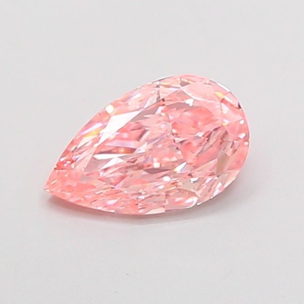 Loose Diamond - PEAR 0.87ct Fancy Vivid Pink VVS2: Loose Diamond - PEAR 0.87ct Fancy Vivid Pink VVS2 Source: This is a real non-mined Diamond that has been grown in a lab Shape: PEAR Carats: 0.87 Color: Fancy Vivid Pink Certification: IGI Video: