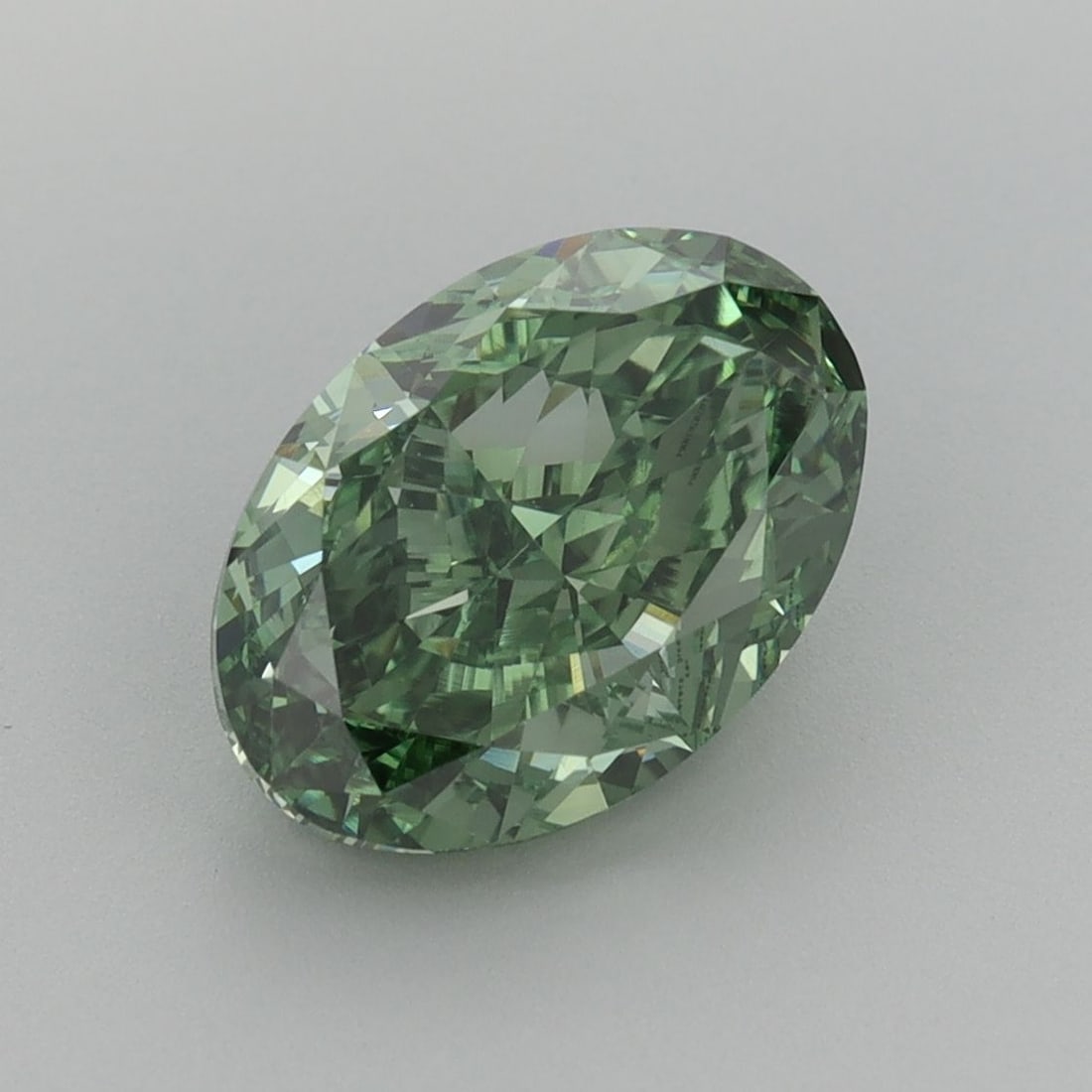 Loose Diamond - OVAL 3.0ct Fancy Vivid Green VVS2: Loose Diamond - OVAL 3.0ct Fancy Vivid Green VVS2 Source: This is a real non-mined Diamond that has been grown in a lab Shape: OVAL Carats: 3.0 Color: Fancy Vivid Green Certification: IGI Video:
