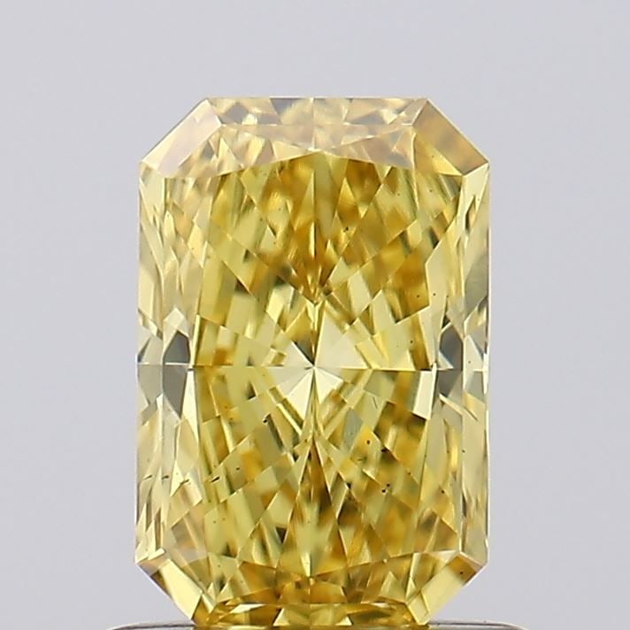 Loose Diamond - RADIANT 0.74ct Fancy Vivid Yellow VS2: Loose Diamond - RADIANT 0.74ct Fancy Vivid Yellow VS2 Source: This is a real non-mined Diamond that has been grown in a lab Shape: RADIANT Carats: 0.74 Color: Fancy Vivid Yellow Certification: IGI Vid