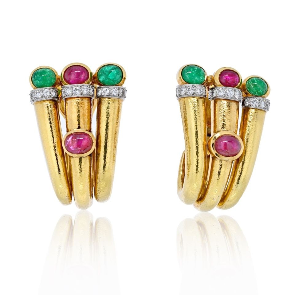 David Webb Platinum 18K Gold Diamond Ruby Emerald Earrings: David Webb Platinum 18K Gold Diamond Ruby Emerald Earrings These exquisite earrings by David Webb feature a striking combination of platinum and 18K yellow gold, weighing 54.5 grams. The hand-hammered