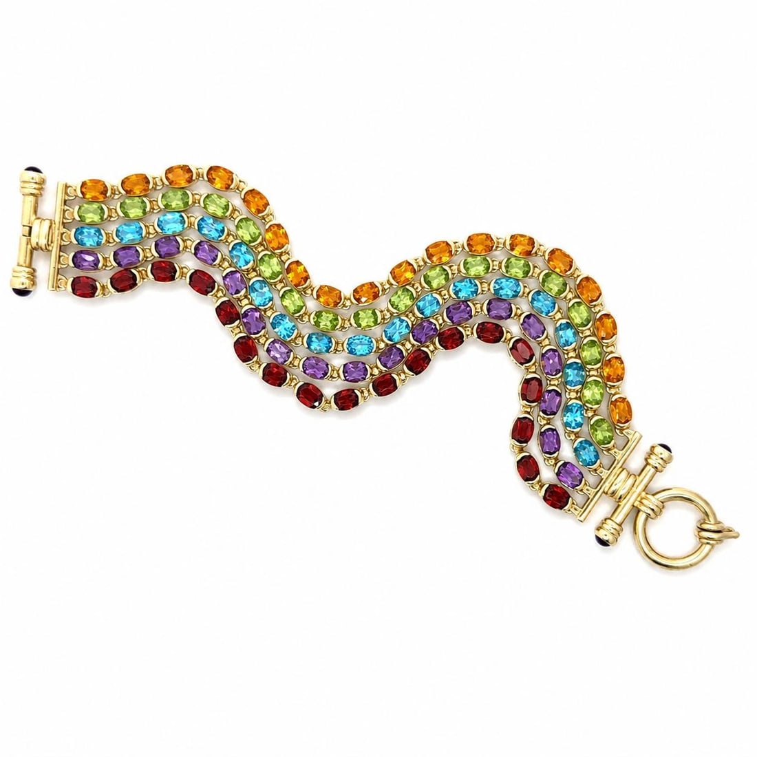 Multi Strand 14k Yellow Gold Bracelet with Citrine Topaz Peridot Amethyst Garnet: Multi Strand 14k Yellow Gold Bracelet with Citrine Topaz Peridot Amethyst Garnet Pre-owned multi-strand bracelet crafted in 14k solid yellow gold and set with natural citrine, peridot, blue topaz, ame