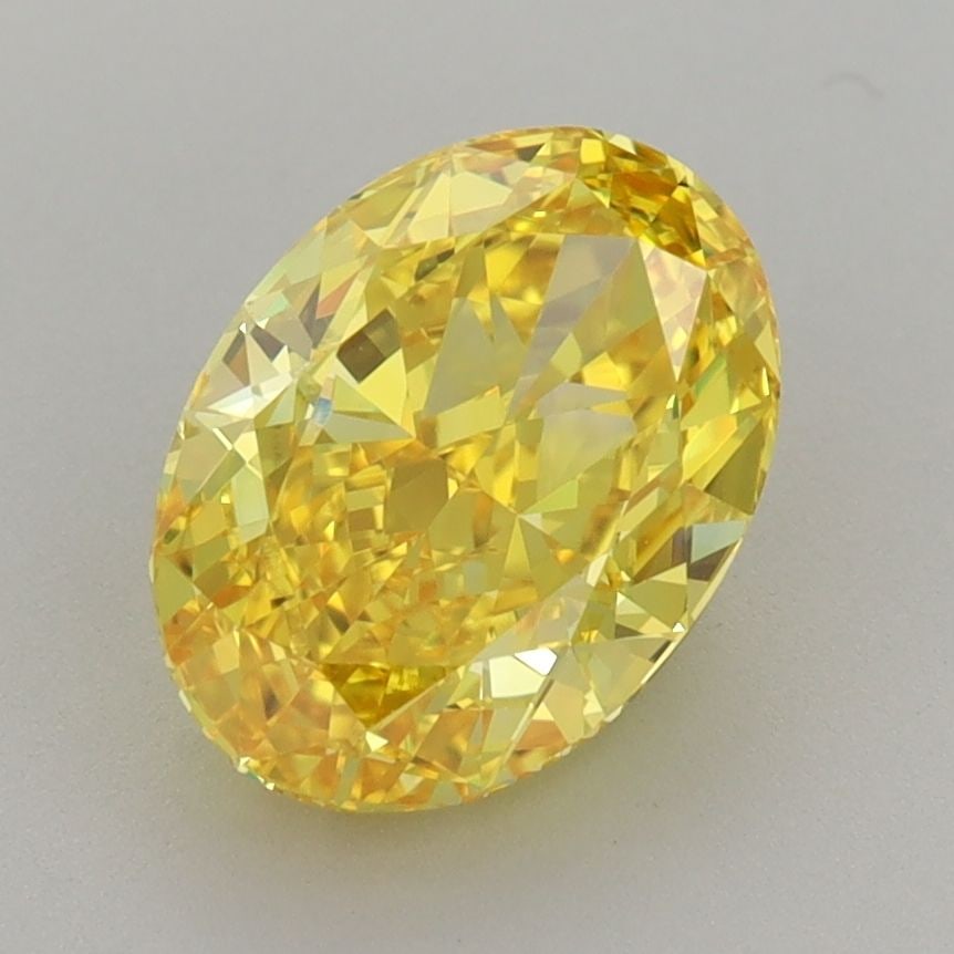 Loose Diamond - OVAL 2.21ct Fancy Vivid Yellow VVS1: Loose Diamond - OVAL 2.21ct Fancy Vivid Yellow VVS1 Source: This is a real non-mined Diamond that has been grown in a lab Shape: OVAL Carats: 2.21 Color: Fancy Vivid Yellow Certification: IGI The Diam