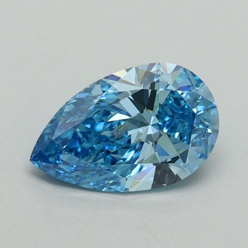 Loose Diamond - PEAR 1.0ct Fancy Vivid Blue VS1: Loose Diamond - PEAR 1.0ct Fancy Vivid Blue VS1 Source: This is a real non-mined Diamond that has been grown in a lab Shape: PEAR Carats: 1.0 Color: Fancy Vivid Blue Certification: IGI Video: