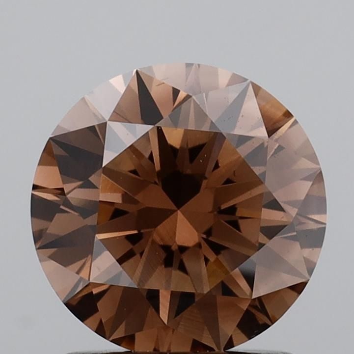 Ideal Loose Diamond - ROUND 1.36ct Fancy Brown VS1: Ideal Loose Diamond - ROUND 1.36ct Fancy Brown VS1 Source: This is a real non-mined Diamond that has been grown in a lab Shape: ROUND Carats: 1.36 Color: Fancy Brown Certification: IGI The Diamond Dep