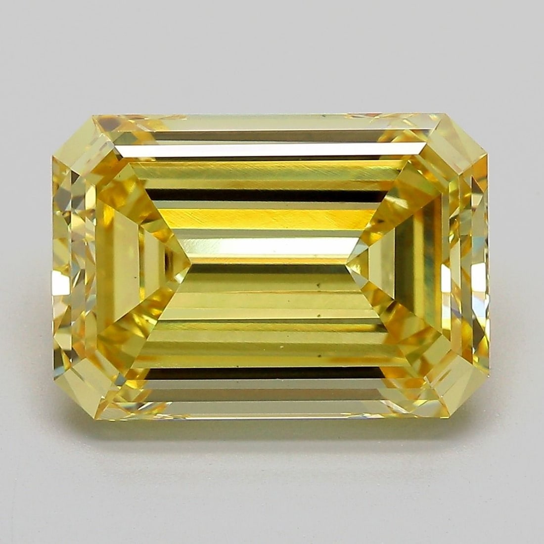 Loose Diamond - EMERALD 7.06ct Fancy Intense Yellow VS1: Loose Diamond - EMERALD 7.06ct Fancy Intense Yellow VS1 Source: This is a real non-mined Diamond that has been grown in a lab Shape: EMERALD Carats: 7.06 Color: Fancy Intense Yellow Certification: IGI