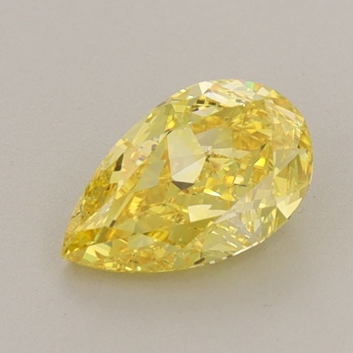 Loose Diamond - PEAR 0.94ct Fancy Vivid Yellow VVS2: Loose Diamond - PEAR 0.94ct Fancy Vivid Yellow VVS2 Source: This is a real non-mined Diamond that has been grown in a lab Shape: PEAR Carats: 0.94 Color: Fancy Vivid Yellow Certification: IGI Video: