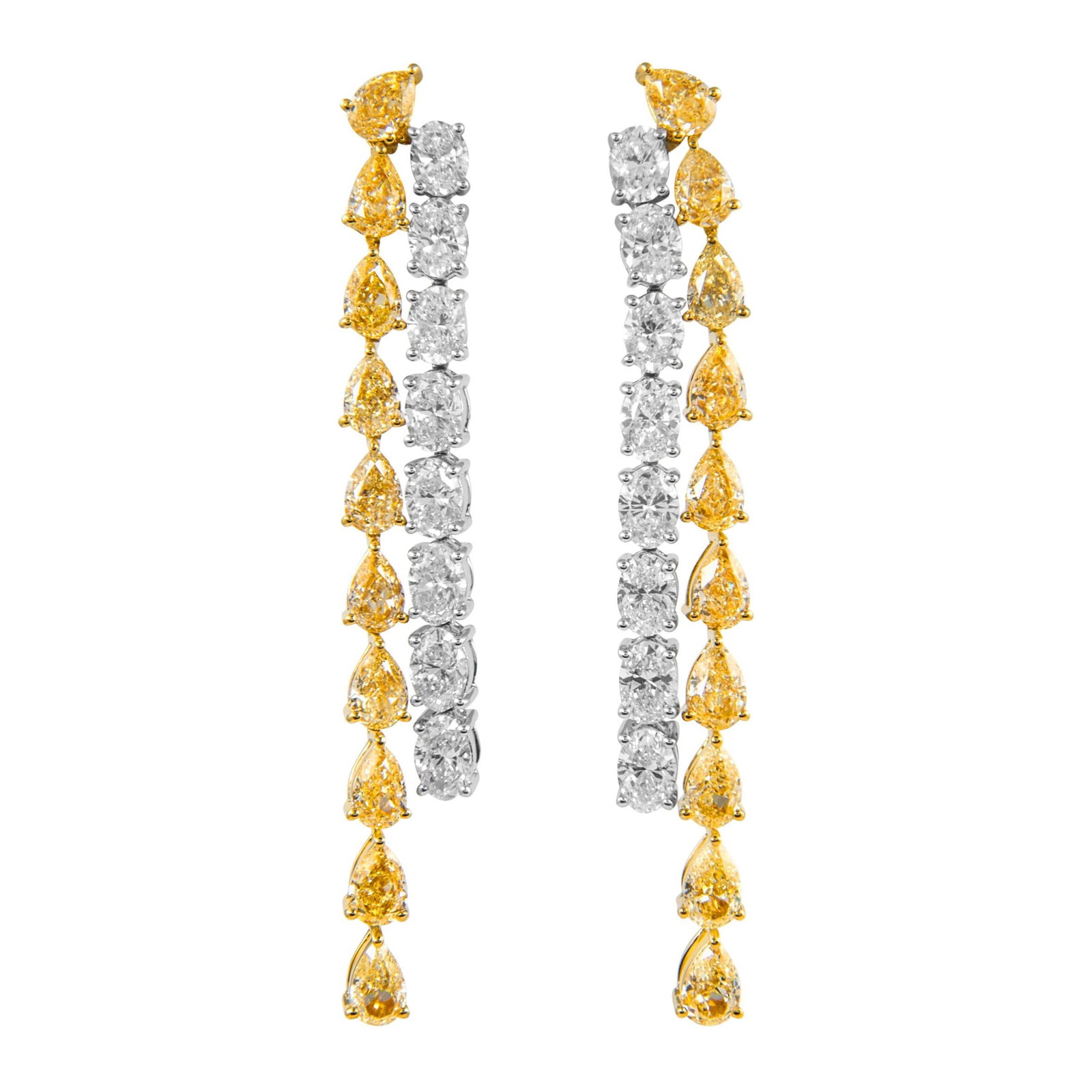 11.44ct Fancy Yellow Diamond Earrings 18k Gold: 11.44ct Fancy Yellow Diamond Earrings 18k Gold Elevate your elegance with these stunning drop earrings featuring 11.44 carats of Fancy Yellow diamonds and crafted in luxurious 18k gold. The design sho