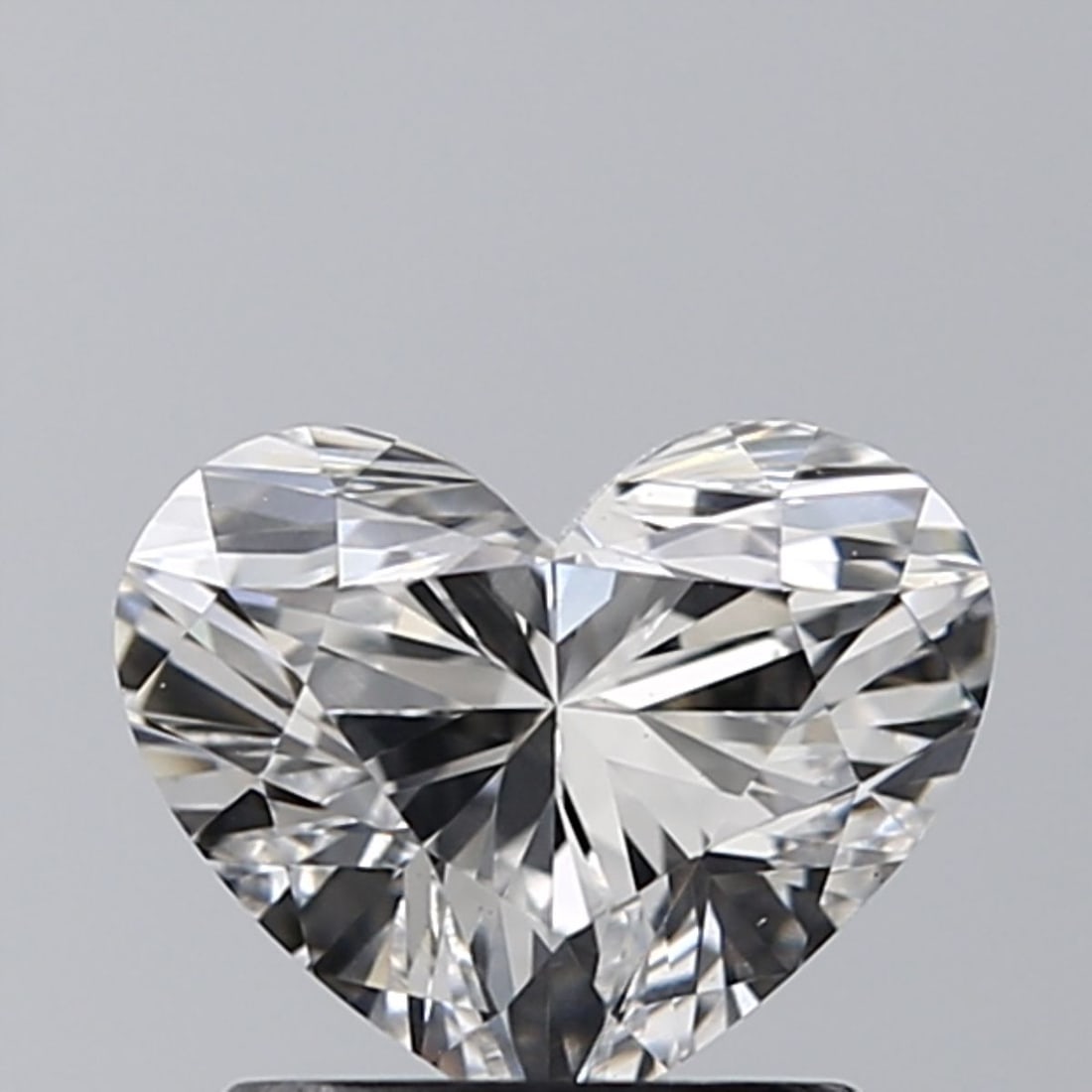 Loose Diamond - HEART 1.2ct E VS1: Loose Diamond - HEART 1.2ct E VS1 Source: This is a real non-mined Diamond that has been grown in a lab Shape: HEART Carats: 1.2 Color: E Clarity: VS1 Certification: IGI Video: