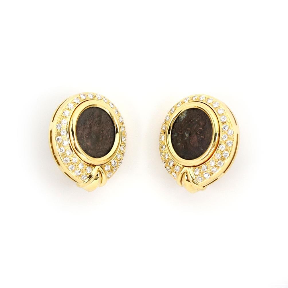 Vintage Roman Coin Diamond Earrings in 18k Yellow Gold Pair: Vintage Roman Coin Diamond Earrings in 18k Yellow Gold Pair This exquisite pair of vintage earrings features a stunning 1.80ct total weight of diamonds set in a beautiful 23mm round frame made from 18