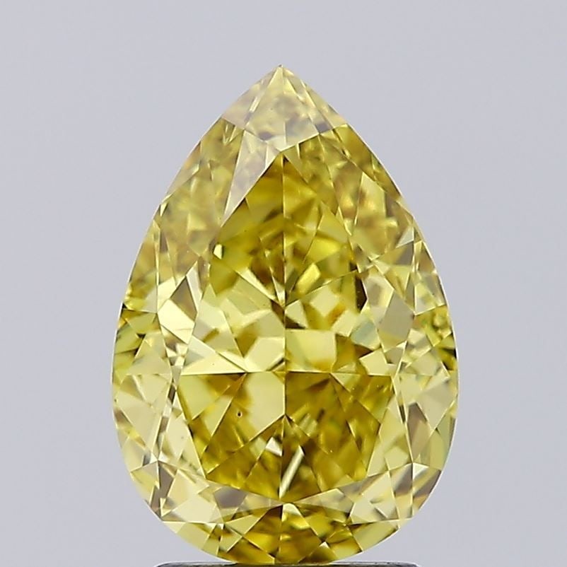 Loose Diamond - PEAR 2.85ct Fancy Vivid Yellow VS1: Loose Diamond - PEAR 2.85ct Fancy Vivid Yellow VS1 Source: This is a real non-mined Diamond that has been grown in a lab Shape: PEAR Carats: 2.85 Color: Fancy Vivid Yellow Certification: IGI Video: