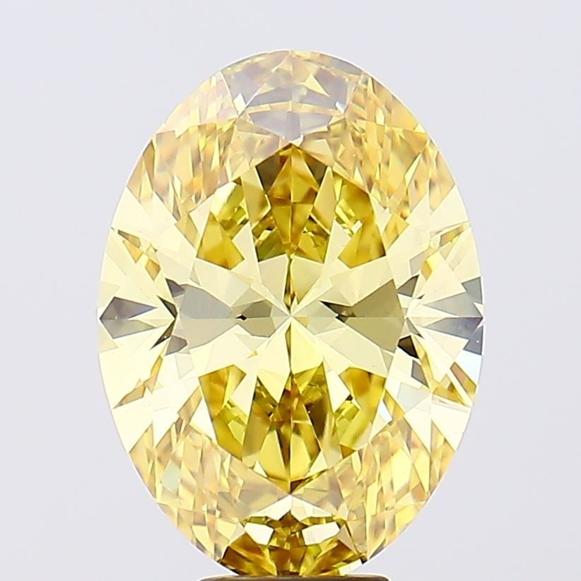 Loose Diamond - OVAL 8.04ct Fancy Vivid Yellow VS1: Loose Diamond - OVAL 8.04ct Fancy Vivid Yellow VS1 Source: This is a real non-mined Diamond that has been grown in a lab Shape: OVAL Carats: 8.04 Color: Fancy Vivid Yellow Certification: IGI Video: