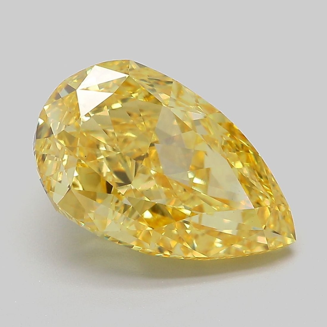Loose Diamond - PEAR 6.03ct Fancy Vivid Yellow VVS2: Loose Diamond - PEAR 6.03ct Fancy Vivid Yellow VVS2 Source: This is a real non-mined Diamond that has been grown in a lab Shape: PEAR Carats: 6.03 Color: Fancy Vivid Yellow Certification: IGI Video: