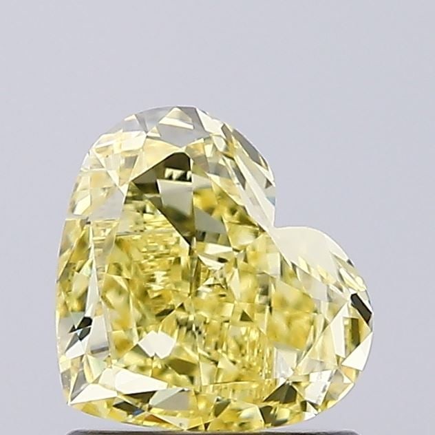 Loose Diamond - HEART 1.04ct Fancy Intense Yellow VVS2: Loose Diamond - HEART 1.04ct Fancy Intense Yellow VVS2 Source: This is a real non-mined Diamond that has been grown in a lab Shape: HEART Carats: 1.04 Color: Fancy Intense Yellow Certification: IGI Vi