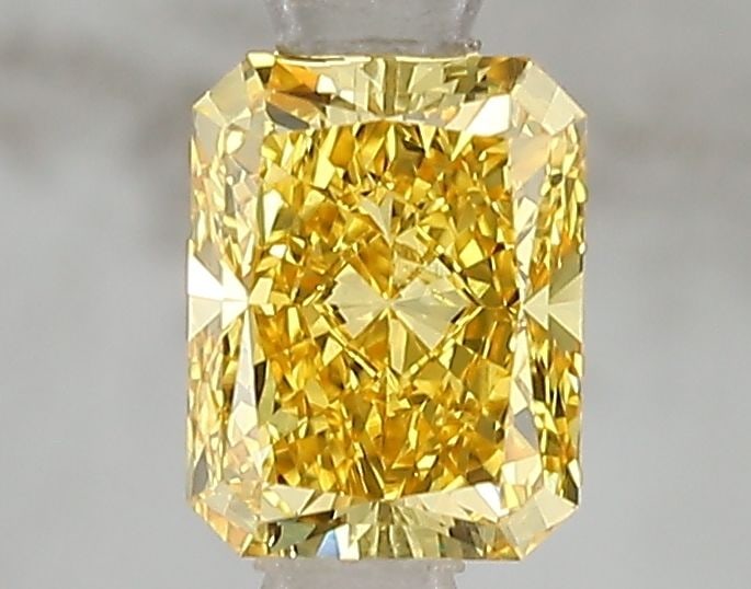 Loose Diamond - RADIANT 1.05ct Fancy Vivid Yellow VS1: Loose Diamond - RADIANT 1.05ct Fancy Vivid Yellow VS1 Source: This is a real non-mined Diamond that has been grown in a lab Shape: RADIANT Carats: 1.05 Color: Fancy Vivid Yellow Certification: IGI