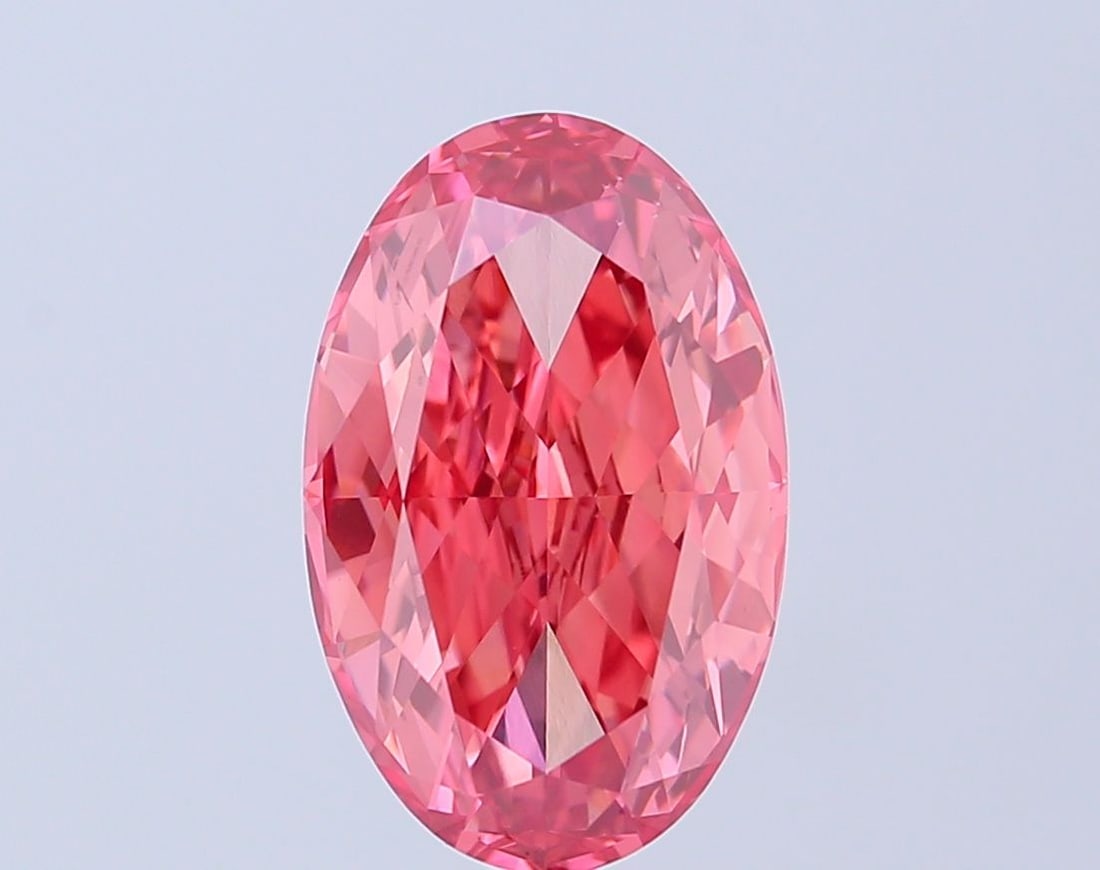Loose Diamond - OVAL 5.07ct Fancy Vivid Pink VS1: Loose Diamond - OVAL 5.07ct Fancy Vivid Pink VS1 Source: This is a real non-mined Diamond that has been grown in a lab Shape: OVAL Carats: 5.07 Color: Fancy Vivid Pink Certification: IGI Video: