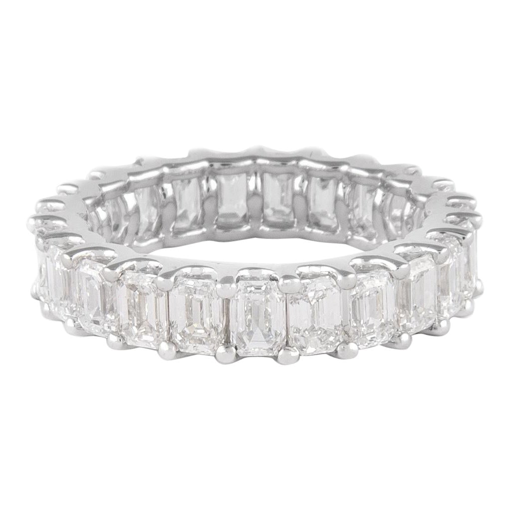 4.51ct Emerald Cut Diamond Eternity Band 18k White Gold: 4.51ct Emerald Cut Diamond Eternity Band 18k White Gold This stunning emerald cut diamond eternity band is a remarkable piece crafted in 18k white gold. Featuring 23 emerald cut diamonds totaling 4.51