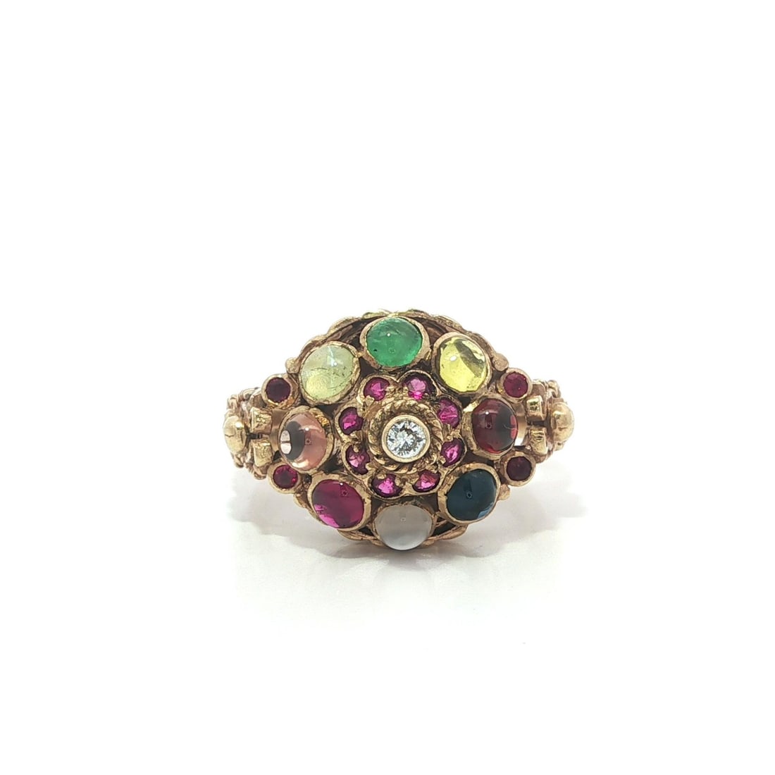 Cocktail Ring in 14k Yellow Gold with Moonstone Cat's Eye Emerald and Diamond Accents: Cocktail Ring in 14k Yellow Gold with Moonstone Cat's Eye Emerald and Diamond Accents This vintage cocktail ring is crafted from solid 14k yellow gold and features a striking pyramid design. The ring 