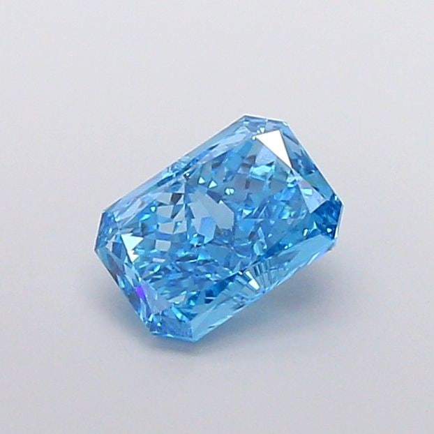 Loose Diamond - RADIANT 1.54ct Fancy Vivid Blue VVS2: Loose Diamond - RADIANT 1.54ct Fancy Vivid Blue VVS2 Source: This is a real non-mined Diamond that has been grown in a lab Shape: RADIANT Carats: 1.54 Color: Fancy Vivid Blue Certification: IGI The Di