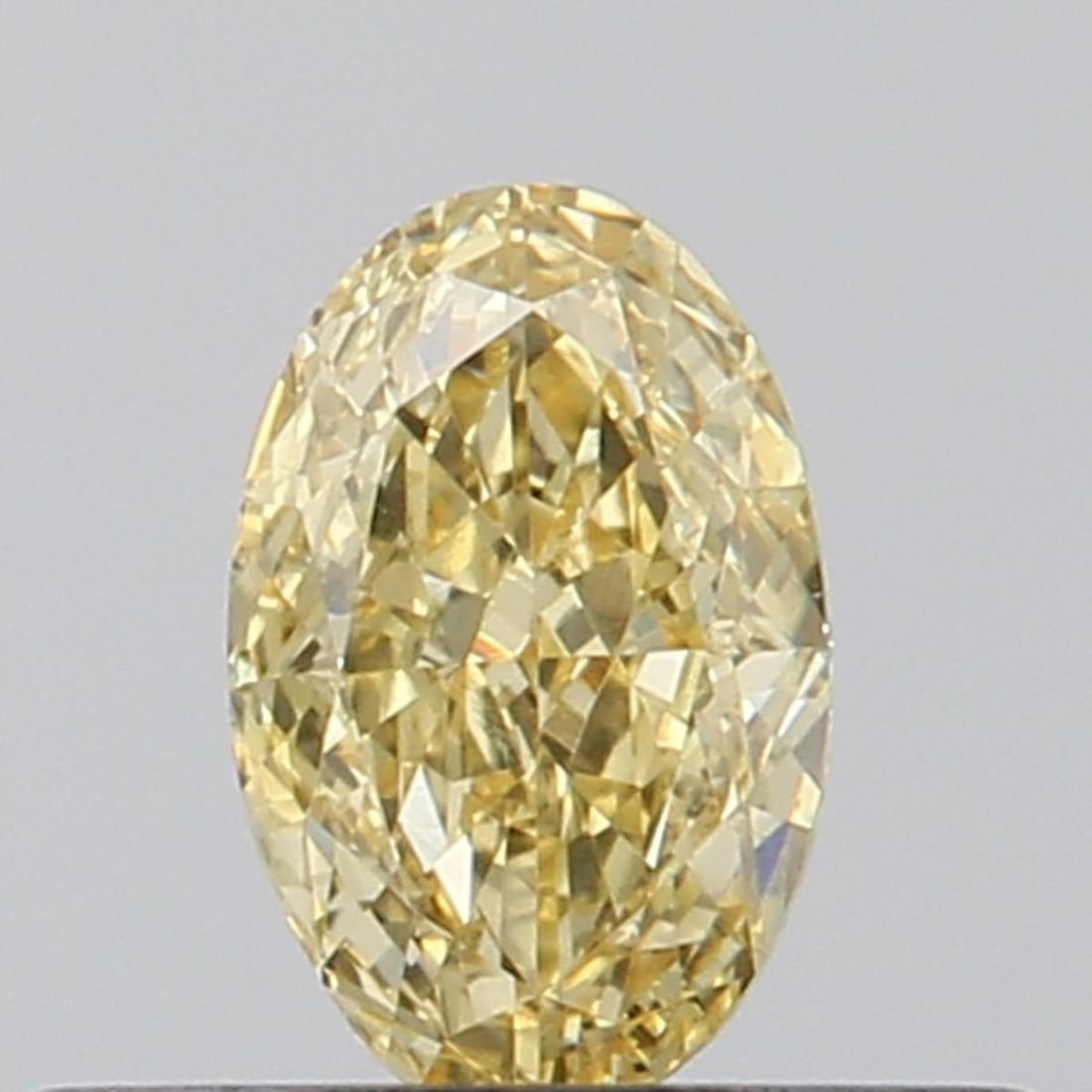 Loose Diamond - OVAL 0.32ct Fancy Vivid Yellow VVS2: Loose Diamond - OVAL 0.32ct Fancy Vivid Yellow VVS2 Source: This is a real non-mined Diamond that has been grown in a lab Shape: OVAL Carats: 0.32 Color: Fancy Vivid Yellow Certification: NONE Video:
