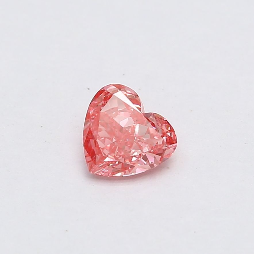 Loose Diamond - HEART 0.61ct Fancy Vivid Pink VS1: Loose Diamond - HEART 0.61ct Fancy Vivid Pink VS1 Source: This is a real non-mined Diamond that has been grown in a lab Shape: HEART Carats: 0.61 Color: Fancy Vivid Pink Certification: NONE The Diamon