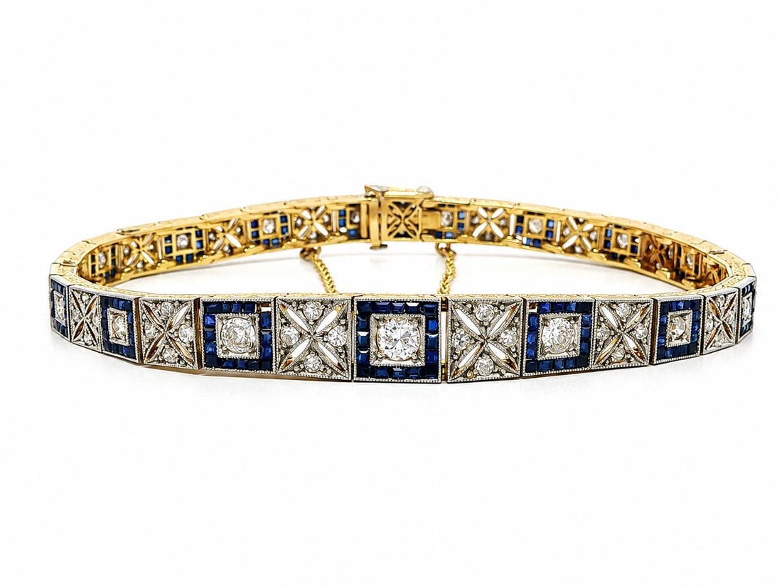 Edwardian 18k Yellow Gold Platinum Top Line Bracelet with Diamonds and Sapphires: Edwardian 18k Yellow Gold Platinum Top Line Bracelet with Diamonds and Sapphires Antique Edwardian graduated line bracelet crafted in solid 17-18k yellow gold with a platinum top. The design features 
