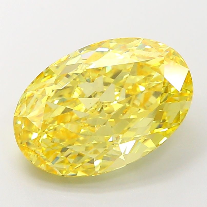 Loose Diamond - OVAL 6.52ct Fancy Vivid Yellow VS1: Loose Diamond - OVAL 6.52ct Fancy Vivid Yellow VS1 Source: This is a real non-mined Diamond that has been grown in a lab Shape: OVAL Carats: 6.52 Color: Fancy Vivid Yellow Certification: IGI Video: