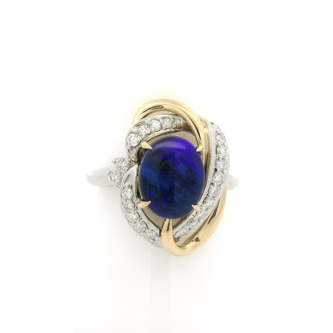 Cabochon Black Opal Diamond Knot Cocktail Ring in Platinum and 18k Gold: Cabochon Black Opal Diamond Knot Cocktail Ring in Platinum and 18k Gold Pre-owned women's cocktail ring featuring a natural genuine oval cabochon black opal accented by natural genuine diamonds in an 