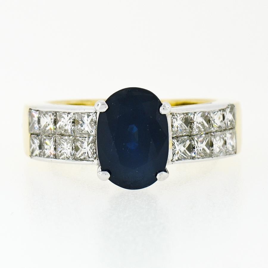 Unbranded 18k Yellow White Gold Ring Oval Sapphire Princess Diamond 3.30ctw: Unbranded 18k Yellow White Gold Ring Oval Sapphire Princess Diamond 3.30ctw Pre-owned women's ring crafted in solid 18k yellow and white gold, featuring a large oval natural blue sapphire solitaire ac