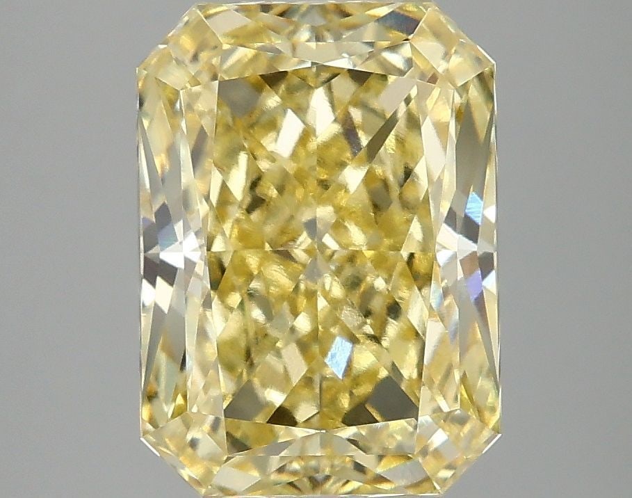 Loose Diamond - RADIANT 4.09ct Fancy Vivid Yellow VVS2: Loose Diamond - RADIANT 4.09ct Fancy Vivid Yellow VVS2 Source: This is a real non-mined Diamond that has been grown in a lab Shape: RADIANT Carats: 4.09 Color: Fancy Vivid Yellow Certification: IGI Vi