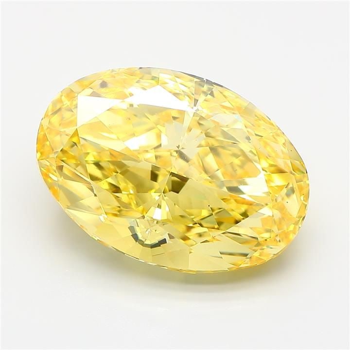 Loose Diamond - OVAL 12.34ct Fancy Vivid Yellow VS1: Loose Diamond - OVAL 12.34ct Fancy Vivid Yellow VS1 Source: This is a real non-mined Diamond that has been grown in a lab Shape: OVAL Carats: 12.34 Color: Fancy Vivid Yellow Certification: IGI Video: