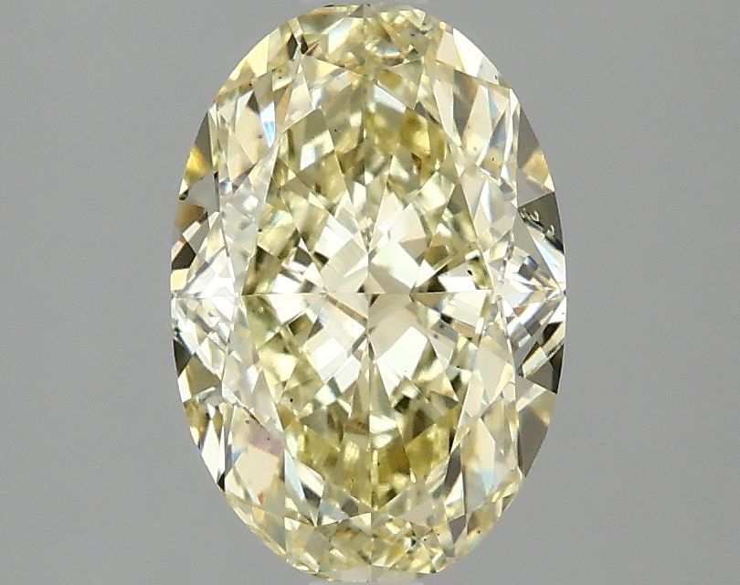 Loose Diamond - OVAL 2.1ct Fancy Intense Yellow VS2: Loose Diamond - OVAL 2.1ct Fancy Intense Yellow VS2 Source: This is a real non-mined Diamond that has been grown in a lab Shape: OVAL Carats: 2.1 Color: Fancy Intense Yellow Certification: IGI Video: