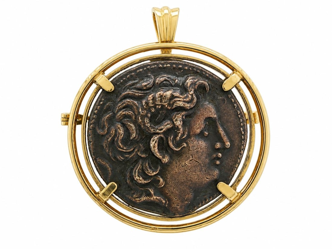 Ancient Alexander the Great Coin Brooch Pendant in 17-18k Yellow Gold: Ancient Alexander the Great Coin Brooch Pendant in 17-18k Yellow Gold Vintage pendant/brooch featuring an ancient Alexander the Great coin set in a solid yellow gold frame with a pin back and rotating