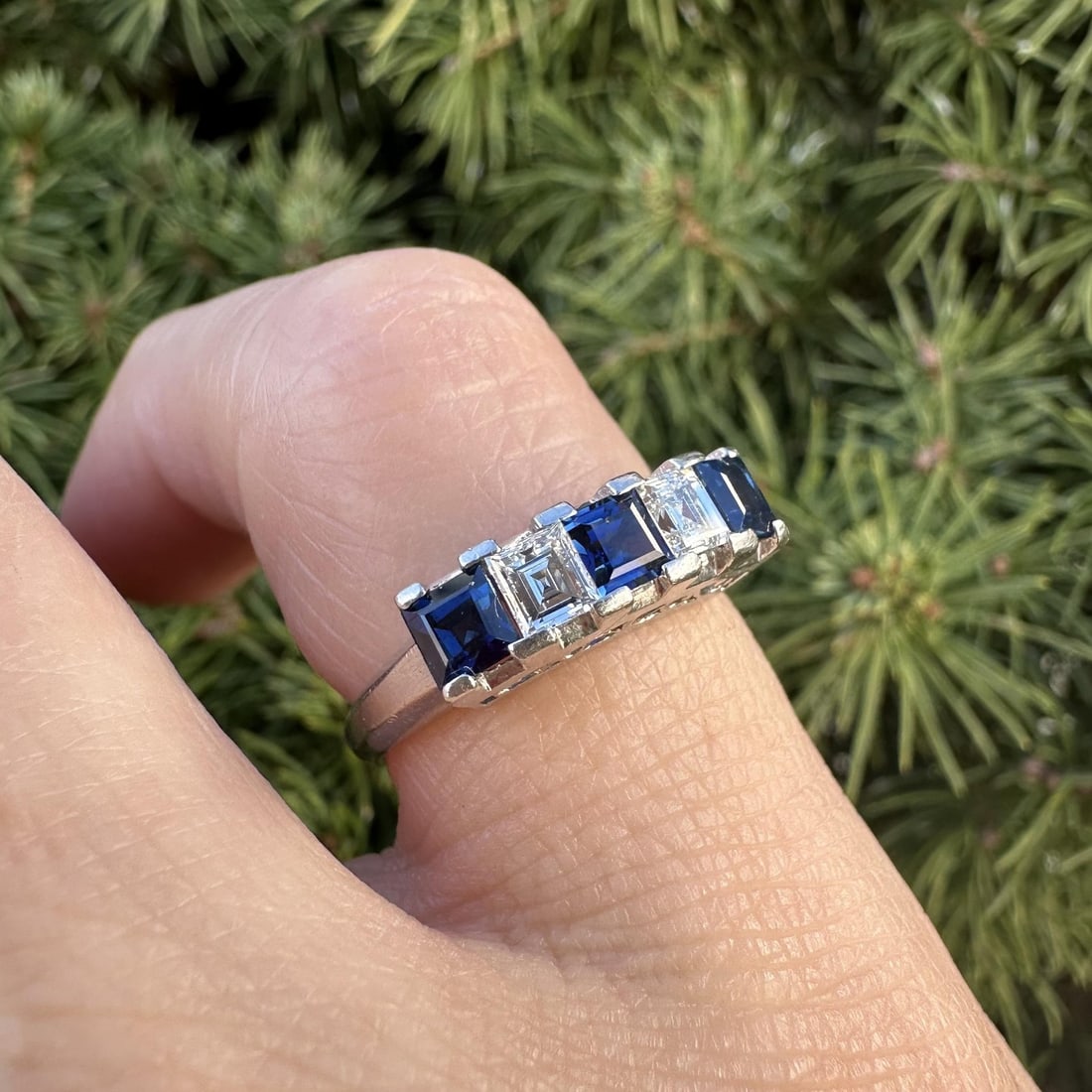 Vintage Platinum Band Ring with Diamond and Sapphire 0.33ctw Size 4.5: Vintage Platinum Band Ring with Diamond and Sapphire 0.33ctw Size 4.5 This exquisite vintage band ring features a high-profile design crafted from solid platinum, stamped PT900. Adorned with two natur
