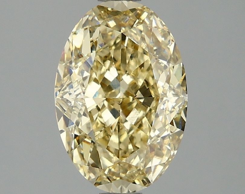 Loose Diamond - OVAL 2.09ct Fancy Intense Yellow VS1: Loose Diamond - OVAL 2.09ct Fancy Intense Yellow VS1 Source: This is a real non-mined Diamond that has been grown in a lab Shape: OVAL Carats: 2.09 Color: Fancy Intense Yellow Certification: IGI Video