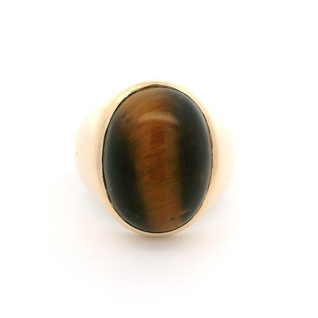 Vintage 9K Yellow Gold Tiger's Eye Bezel Solitaire Ring: Vintage 9K Yellow Gold Tiger's Eye Bezel Solitaire Ring This Vintage Unisex Solid Yellow Gold Large Tiger's Eye Bezel Solitaire Ring showcases a stunning natural genuine Tiger's Eye stone, expertly se
