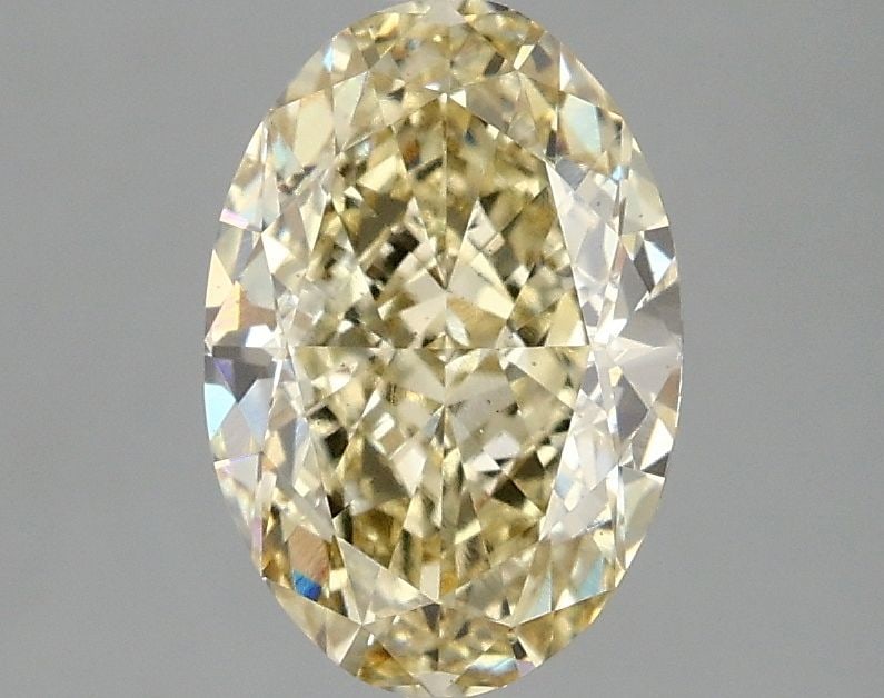 Loose Diamond - OVAL 2.1ct Fancy Yellow VS2: Loose Diamond - OVAL 2.1ct Fancy Yellow VS2 Source: This is a real non-mined Diamond that has been grown in a lab Shape: OVAL Carats: 2.1 Color: Fancy Yellow Certification: IGI Video: