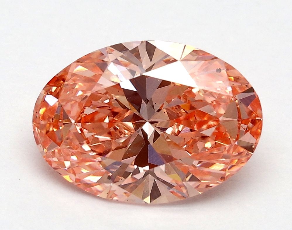 Loose Diamond - OVAL 1.7ct Fancy Vivid Pink VS2: Loose Diamond - OVAL 1.7ct Fancy Vivid Pink VS2 Source: This is a real non-mined Diamond that has been grown in a lab Shape: OVAL Carats: 1.7 Color: Fancy Vivid Pink Certification: IGI Video: