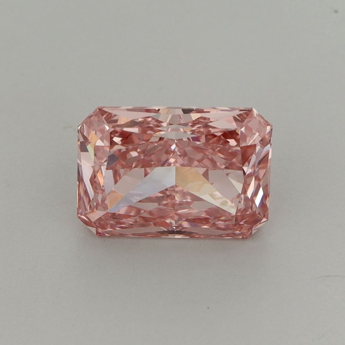 Loose Diamond - RADIANT 2.1ct Fancy Vivid Pink VVS2: Loose Diamond - RADIANT 2.1ct Fancy Vivid Pink VVS2 Source: This is a real non-mined Diamond that has been grown in a lab Shape: RADIANT Carats: 2.1 Color: Fancy Vivid Pink Certification: IGI The Diam