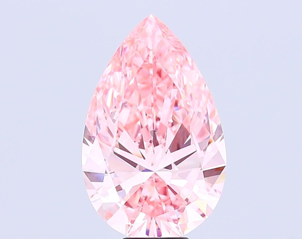 Loose Diamond - PEAR 10.58ct Fancy Vivid Pink VVS2: Loose Diamond - PEAR 10.58ct Fancy Vivid Pink VVS2 Source: This is a real non-mined Diamond that has been grown in a lab Shape: PEAR Carats: 10.58 Color: Fancy Vivid Pink Certification: IGI Video: