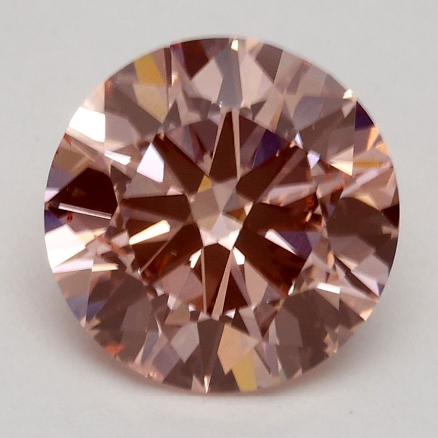 Loose Diamond - ROUND 2.3ct Fancy Intense Pink SI1: Loose Diamond - ROUND 2.3ct Fancy Intense Pink SI1 Source: This is a real non-mined Diamond that has been grown in a lab Shape: ROUND Carats: 2.3 Color: Fancy Intense Pink Certification: IGI Video: