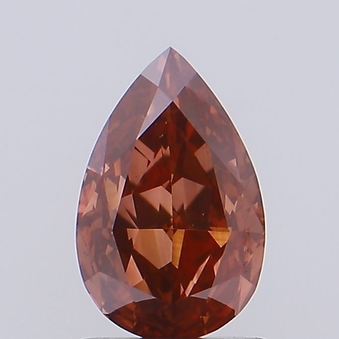 Loose Diamond - PEAR 1.31ct Fancy Vivid Brown VS1: Loose Diamond - PEAR 1.31ct Fancy Vivid Brown VS1 Source: This is a real non-mined Diamond that has been grown in a lab Shape: PEAR Carats: 1.31 Color: Fancy Vivid Brown Certification: NONE Video: