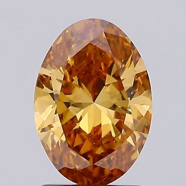 Loose Diamond - OVAL 1.61ct Fancy Vivid Orange VS1: Loose Diamond - OVAL 1.61ct Fancy Vivid Orange VS1 Source: This is a real non-mined Diamond that has been grown in a lab Shape: OVAL Carats: 1.61 Color: Fancy Vivid Orange Certification: IGI The Diamo