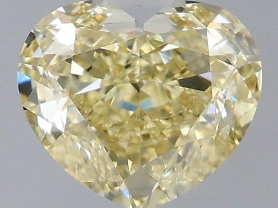 Loose Diamond - HEART 1.58ct Fancy Yellow VVS2: Loose Diamond - HEART 1.58ct Fancy Yellow VVS2 Source: This is a real non-mined Diamond that has been grown in a lab Shape: HEART Carats: 1.58 Color: Fancy Yellow Certification: IGI Video: