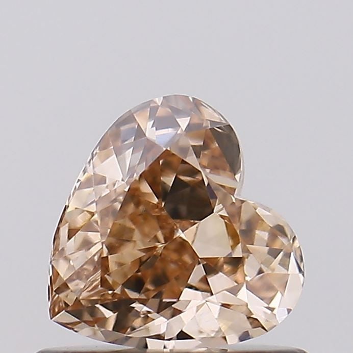 Loose Diamond - HEART 0.57ct Fancy Brown VS1: Loose Diamond - HEART 0.57ct Fancy Brown VS1 Source: This is a real non-mined Diamond that has been grown in a lab Shape: HEART Carats: 0.57 Color: Fancy Brown Certification: NONE Video: