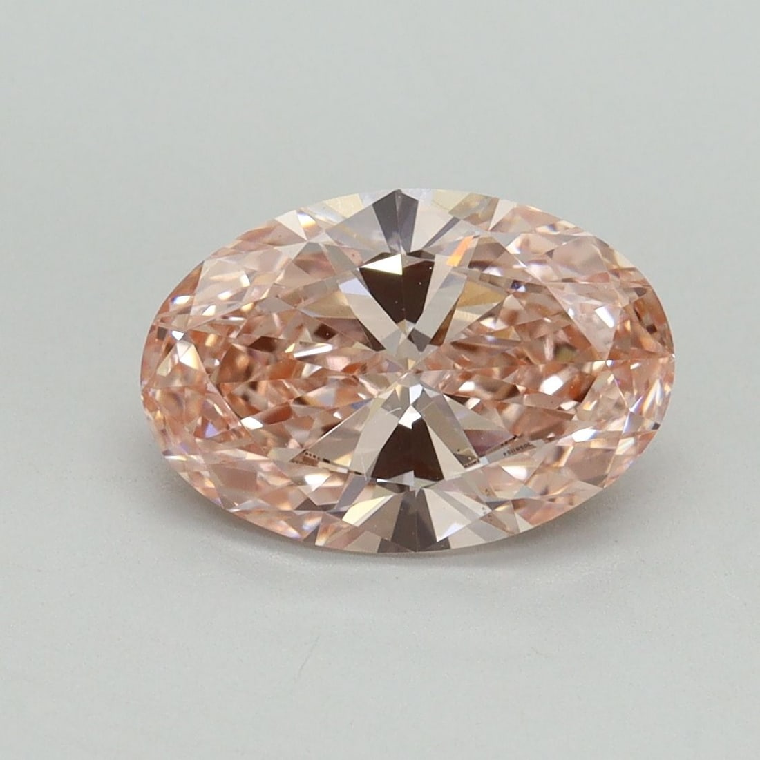 Loose Diamond - OVAL 2.08ct Fancy Vivid Pink VS1: Loose Diamond - OVAL 2.08ct Fancy Vivid Pink VS1 Source: This is a real non-mined Diamond that has been grown in a lab Shape: OVAL Carats: 2.08 Color: Fancy Vivid Pink Certification: IGI Video: Video