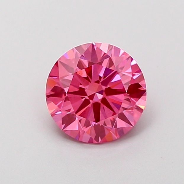 Ideal Loose Diamond - ROUND 1.01ct Fancy Vivid Pink VS1: Ideal Loose Diamond - ROUND 1.01ct Fancy Vivid Pink VS1 Source: This is a real non-mined Diamond that has been grown in a lab Shape: ROUND Carats: 1.01 Color: Fancy Vivid Pink Certification: IGI Video