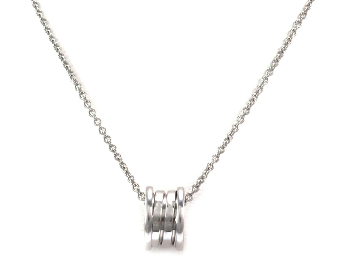 Bvlgari B.zero1 18k White Gold Mini Ring Pendant Necklace: Bvlgari B.zero1 18k White Gold Mini Ring Pendant Necklace Authentic Bvlgari B.zero1 Mini Ring pendant necklace in 18k white gold. This original signed piece features the iconic four-band mini ring pen